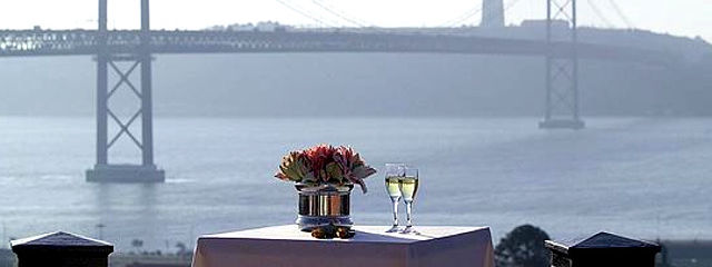 Lisbon, with a view of the 25th of April Bridge and the Tagus River &copy; / Images of Portugal, illustration